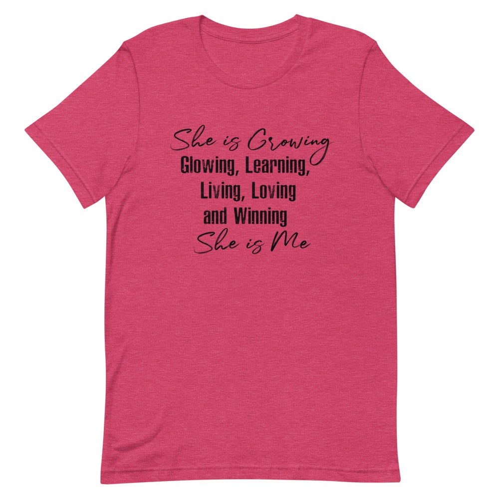 SHE IS GROWING, GLOWING, LEARNING, LIVING, LOVING AND WINNING. SHE IS ME WOMEN'S T- SHIRT (BLACK FONT) Heather Raspberry S 