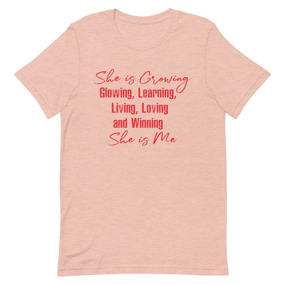 SHE IS GROWING, GLOWING, LEARNING, LIVING, LOVING AND WINNING. SHE IS ME WOMEN'S T- SHIRT (RED FONT) Heather Prism Peach S 
