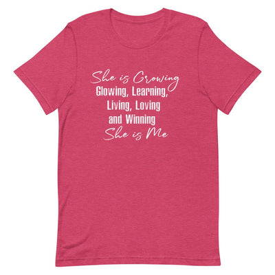 SHE IS GROWING, GLOWING, LEARNING, LIVING, LOVING AND WINNING SHE IS ME WOMEN'S T- SHIRT (WHITE FONT) Heather Raspberry S 